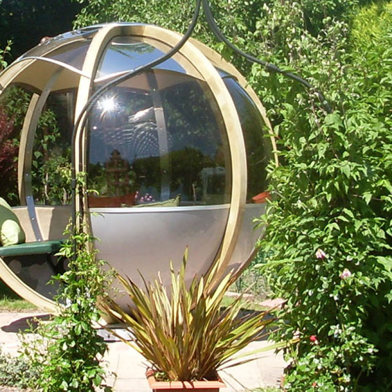 Relax in an Ornate Rotating Garden Pod