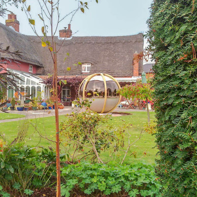 Ornate garden Rotating Seater Garden Pod
