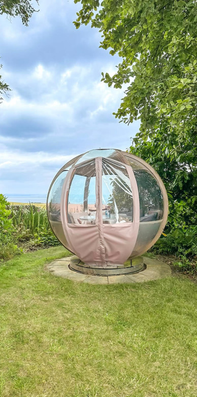 Ornate garden Rotating Seater Garden Pod