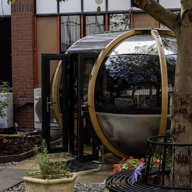 Ornate Garden Pod and Wheel Benches for Hospital Staff Wellbeing
