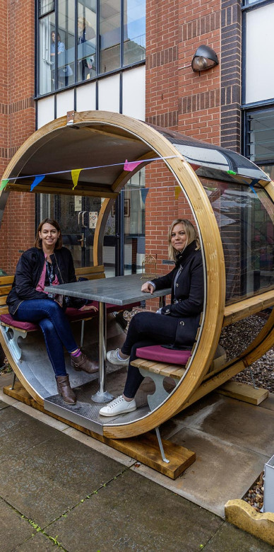 Ornate Garden Pod and Wheel Benches for Hospital Staff Wellbeing
